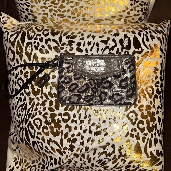 Coach Handbags - Brand Coach change purse. Animal print-Leopard print